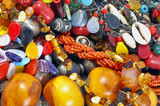 Fototapeta Kuchnia - Colorful natural stone necklaces, jewelry background