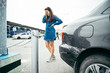 © phpetrunina14 - sad woman standing near car with scratch