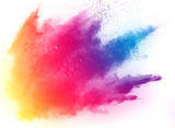 Fototapeta Tęcza - abstract multicolored powder splatted on white background,Freeze motion of color powder exploding