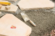 Sandsteinplatten in ein Mörtelbett aus Trasszement und Splitt  -  Terrasse aus Naturstein