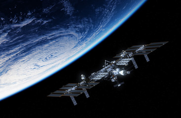 Wall Mural - international space station orbiting planet earth