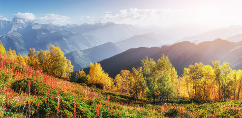 Wall Mural - Fantastic snow-capped mountains in the beautiful cumulus clouds