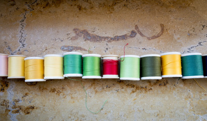 Colorful Rolls of Yarn lined up