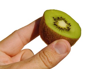 Kiwifruit also called chinese goosebery or latin Actinidia sliced in a half held in left hand on white background