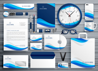 Wall Mural - brans stationery design for your business in blue wave style