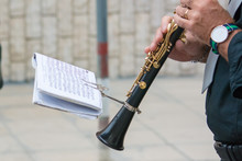 Clarinet Band Musician Walking In The Street