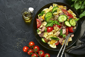Wall Mural - Tuna salad with pasta and vegetables.Top view.