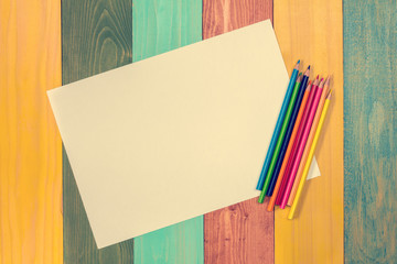 Blank paper and colorful pencils