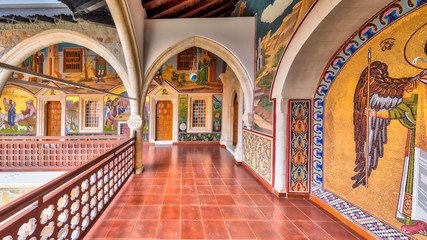 Wall Mural - Arcade in monastery with mosaics inlaid with gold