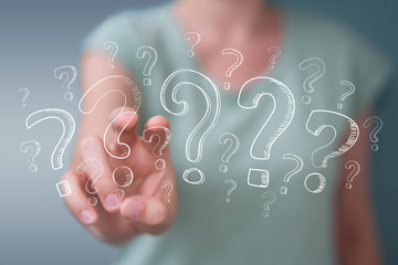 Poster - Businesswoman touching and holding hand drawn question marks