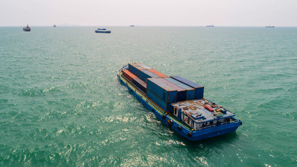 container,container ship in import export and business logistic,By crane,Trade Port , Shipping,cargo to harbor.Aerial view,Water transport,International,Shell Marine,transportation,logistic,trade,port