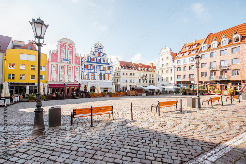 View on the Market square with beautiful colorful buildings during the morning light in Szczecin city, Poland - obrazy, fototapety, plakaty 