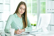 © aletia2011 - young woman in office