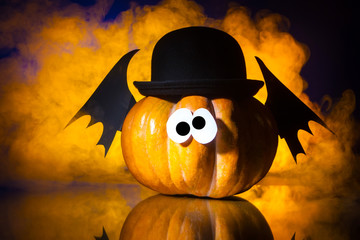 Pumpkin with the wings of a vampire. Pumpkin for Halloween