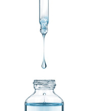 Drop Falls From A Pipette Into A Cosmetic Bottle On White Background