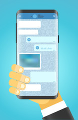 Aufkleber - Man holding modern smartphone. Modern smartphone messenger app