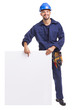 Smiling young worker holding a white placard ready for your text or product