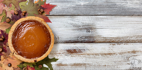 Wall Mural - Baked homemade pumpkin pie for the Autumn holiday celebrations