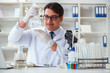 © Elnur - Young researcher scientist doing a water test contamination expe