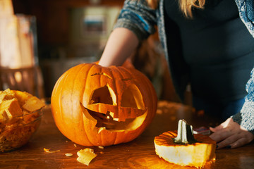 family fun activity - carved pumpkins into jack-o-laterns for halloween close up