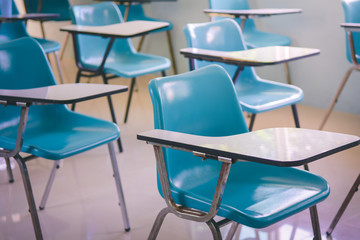 Empty classroom with chairs and desks in School or college .