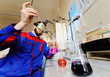 © Evgeniy Kalinovskiy - A young scientist conducts chemical experiments in the laboratory