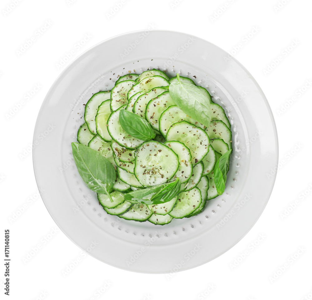 Cucumber salad on plate, isolated on white