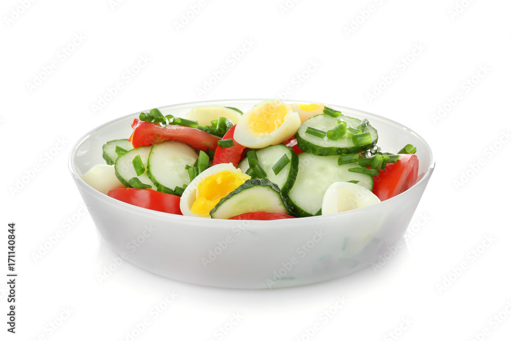 Healthy salad with cucumbers and eggs in bowl, isolated on white