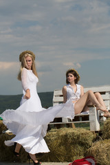 Wall Mural - Girl with blond hair dancing in white dress