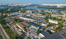 Aerial Top View Of Industrial Park Zone From Above, Factory Chimneys And Warehouses, Industry District In Kiev (Kyiv), Ukraine
