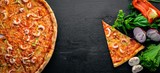 Fototapeta  - Pizza with shrimp. On a wooden background. Top view. Free space for text.