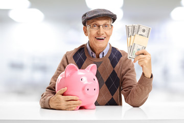 Poster - Senior with a piggybank and bundles of money