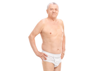 Canvas Print - Mature man in underwear looking at the camera