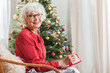 © Yakobchuk Olena - Positive senior female is expressing happiness in holiday