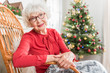 © Yakobchuk Olena - Elegant mature lady is expressing gladness about celebration
