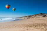 Fototapeta  - Hot air balloon over beach in summer, New south wales, Australia