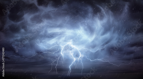 Rain And Thunderstorm In Dramatic Sky