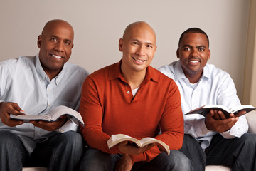 Diverse group of men studying together.