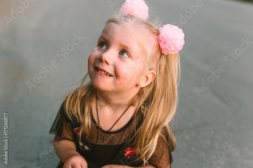 Portrait Of Child Girl With Blonde Hair And Blue Eyes Buy This