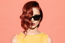 Close-up Portrait Of Stylish Ginger Woman In Sunglasses.