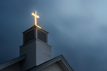 Lit Church Cross with Dramatic Clouds