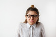 © shurkin_son - Head shot of unhappy office worker female, upset delay salary payment again. Sales manager in formal clothes and glasses looking up with angry facial expression. Negative human facial expression