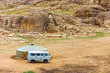Tourist Van Outside Yurt Rocky Mongolian Landscape