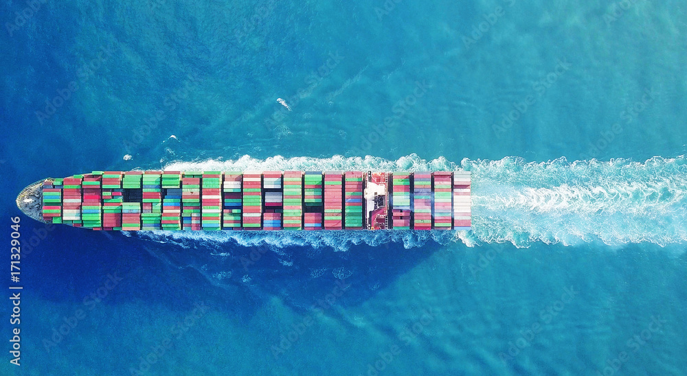 Mega huge fully loaded container ship at sea aerial top down - obrazy, fototapety, plakaty 