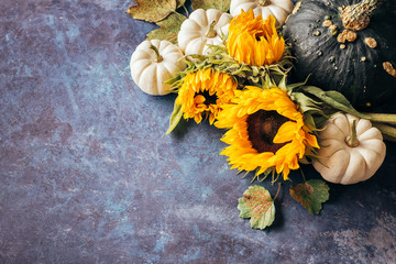 Wall Mural - pumpkins, sunflowers and autumn leaves.