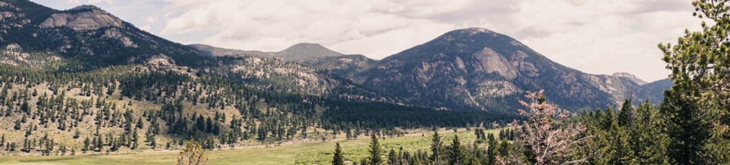 Wall Mural - Panorama of the high mountain valley. Journey to the Rocky Mountain National Park