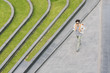 © Lumina/Stocksy - Overhead View of a Man Walking Outdoors