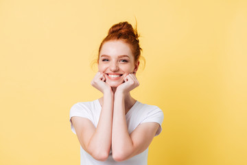 Poster - Happy ginger woman in t-shirt reclines on hands