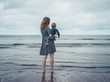 © LoloStock - Mother with baby looking at the sea