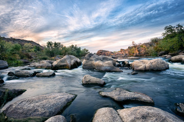 Wall Mural - roll on a mountain river among the stones